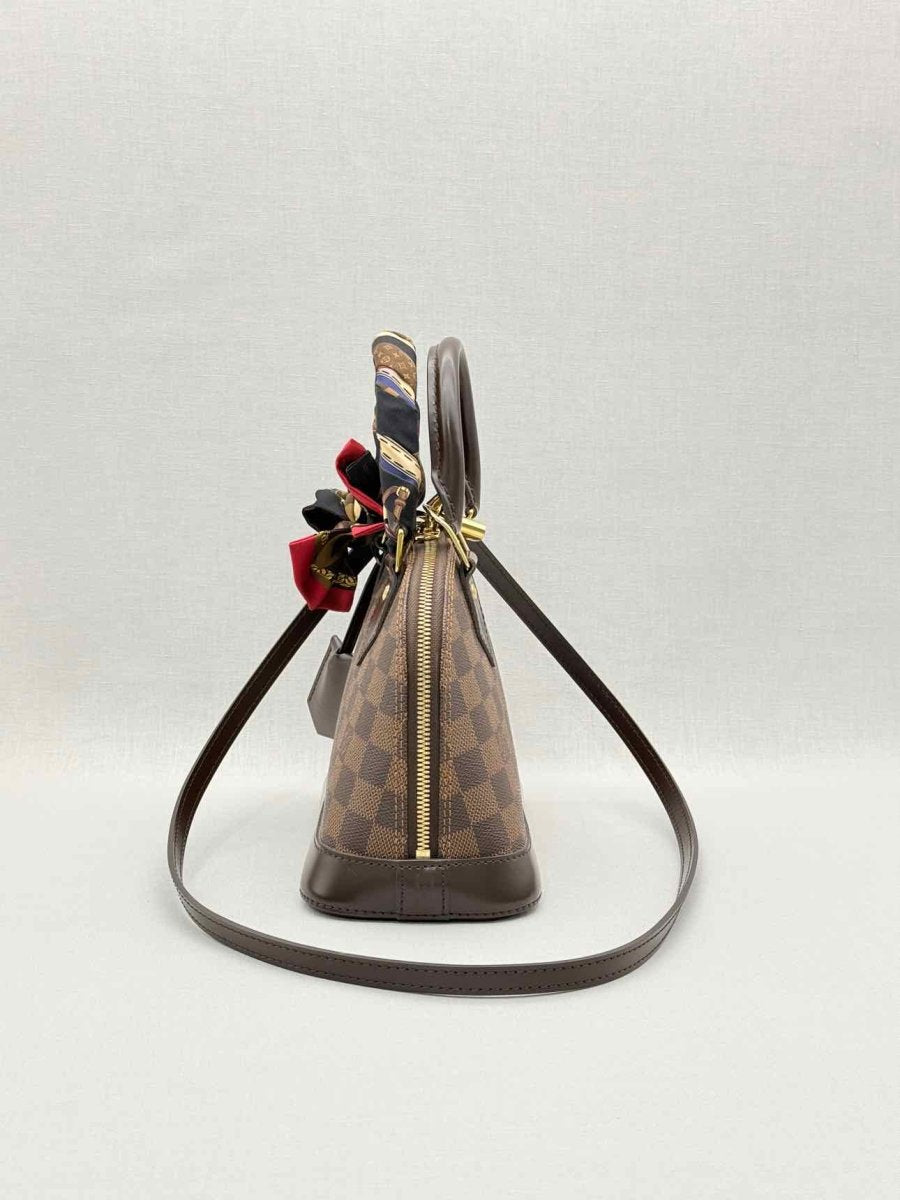 Pre - loved LOUIS VUITTON Alma Brown Damier Ebene Top Handle at Reems Closet