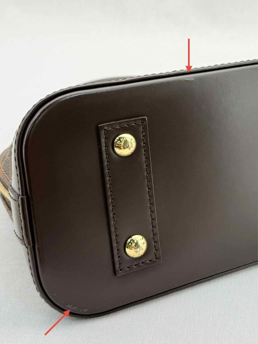 Pre - loved LOUIS VUITTON Alma Brown Damier Ebene Top Handle at Reems Closet