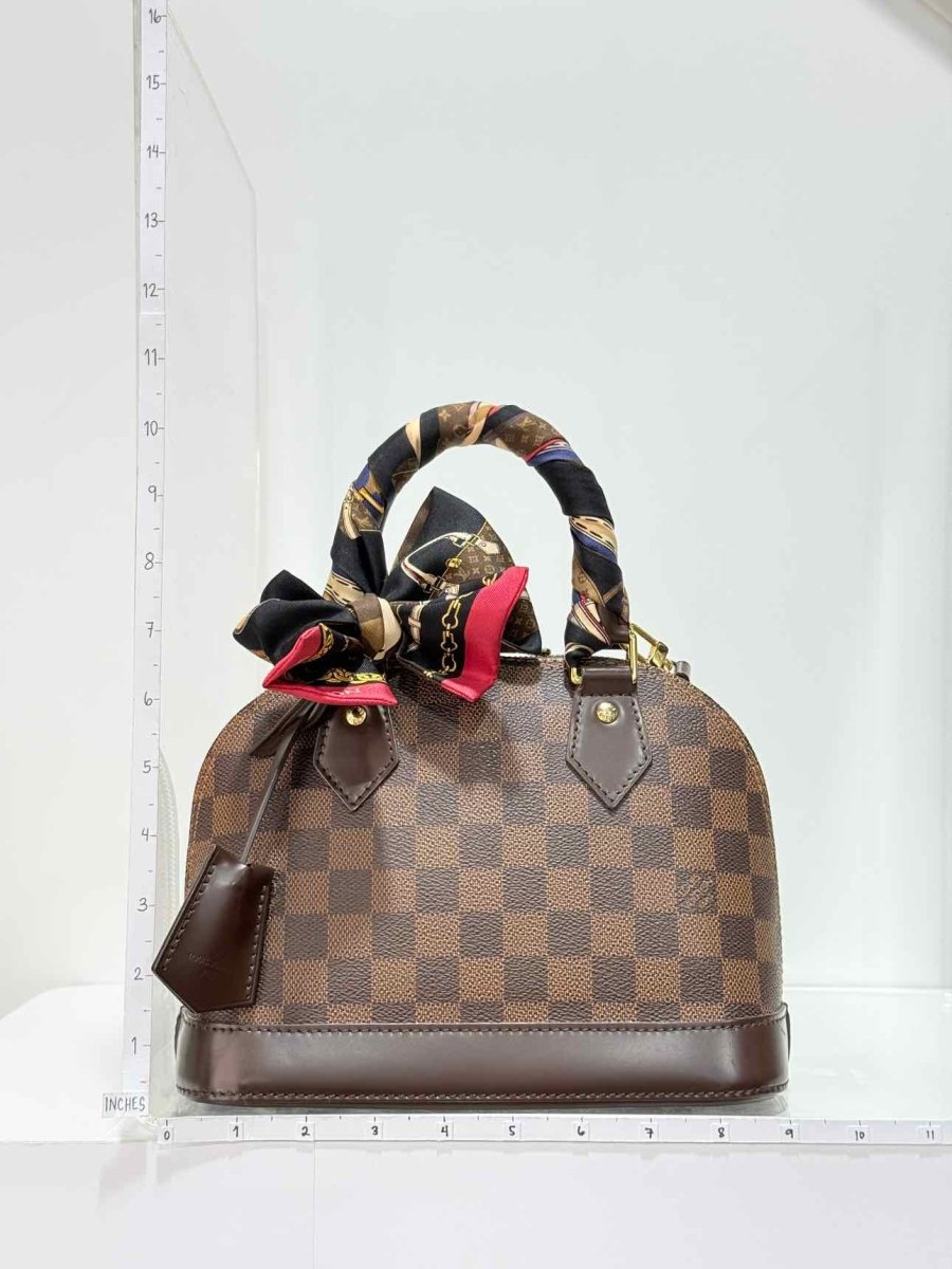 Pre - loved LOUIS VUITTON Alma Brown Damier Ebene Top Handle at Reems Closet