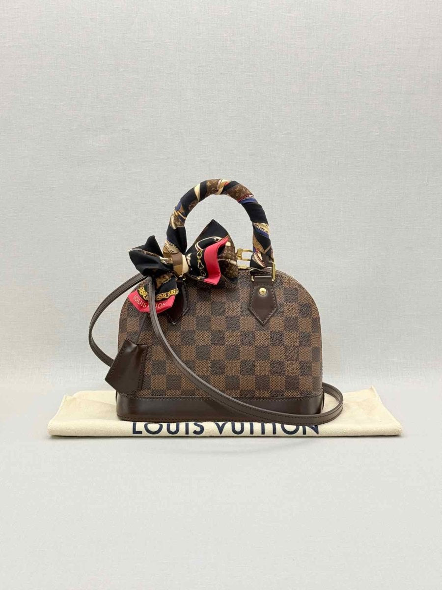 Pre - loved LOUIS VUITTON Alma Brown Damier Ebene Top Handle at Reems Closet