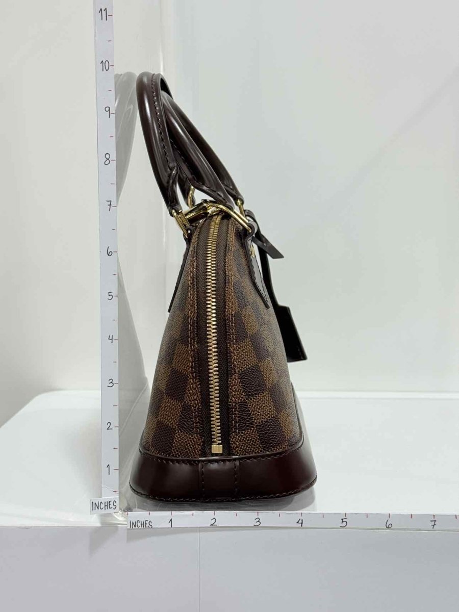 Pre - loved LOUIS VUITTON Alma Brown Damier Ebene Top Handle at Reems Closet