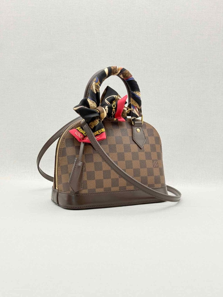 Pre - loved LOUIS VUITTON Alma Brown Damier Ebene Top Handle at Reems Closet