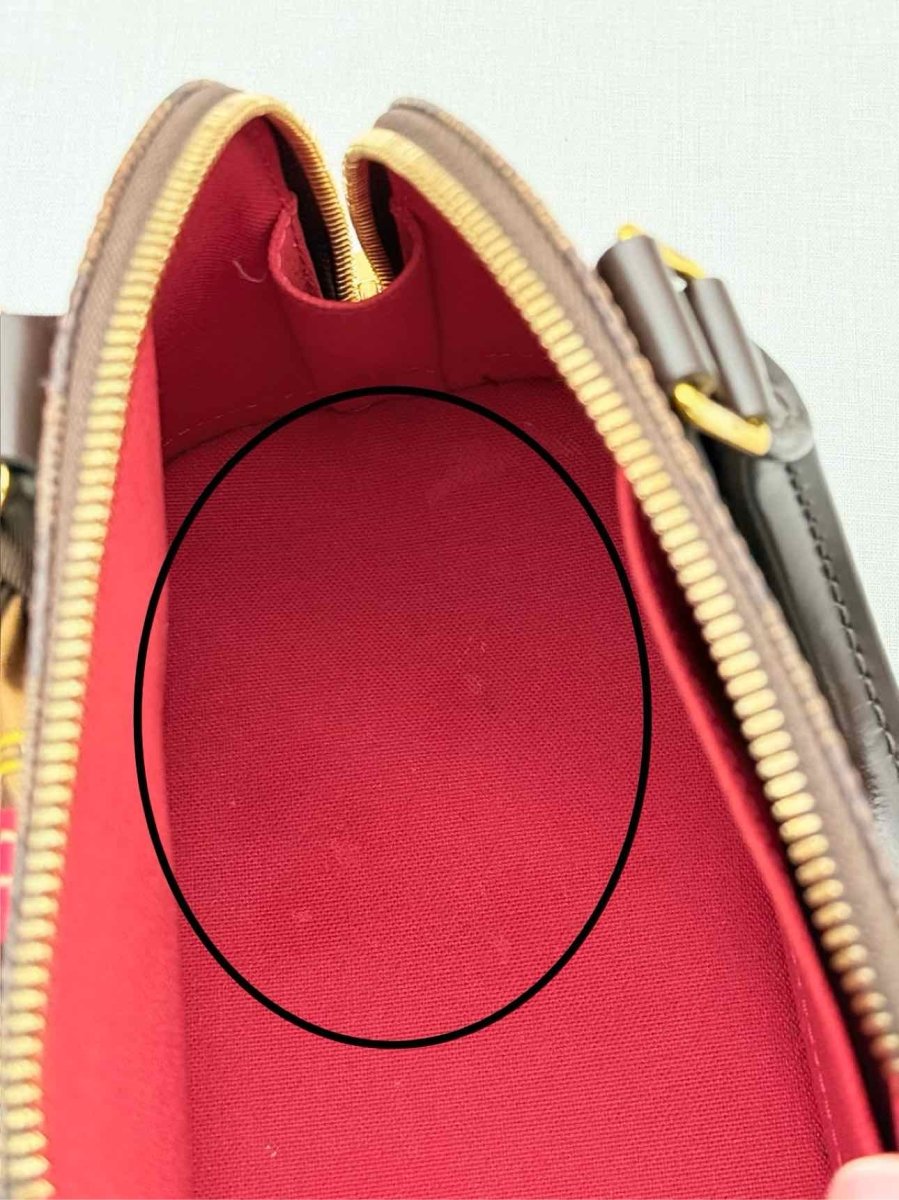 Pre - loved LOUIS VUITTON Alma Brown Damier Ebene Top Handle at Reems Closet