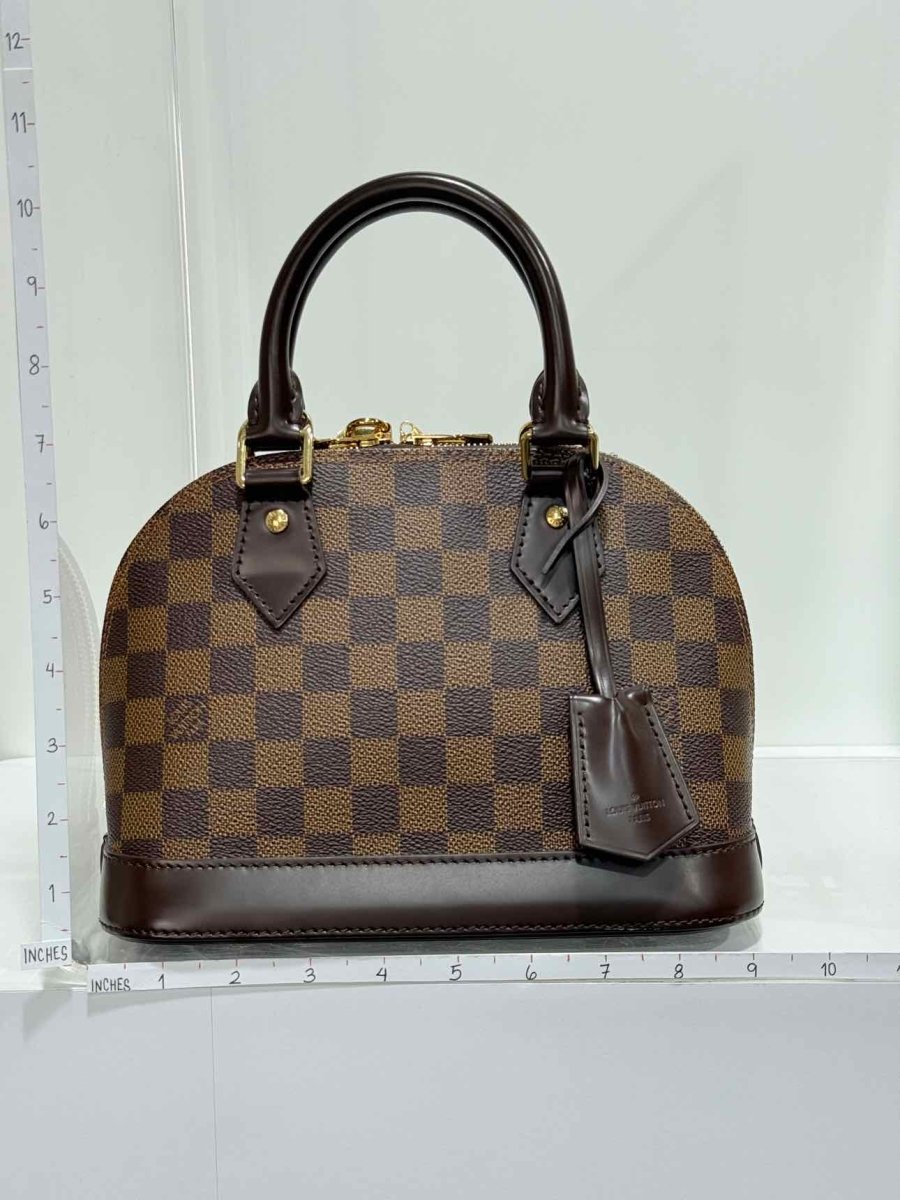 Pre - loved LOUIS VUITTON Alma Brown Damier Ebene Top Handle at Reems Closet