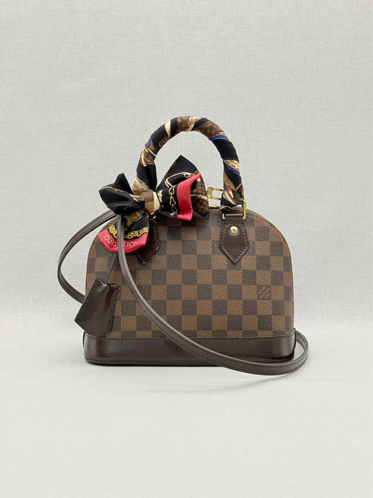 Pre - loved LOUIS VUITTON Alma Brown Damier Ebene Top Handle at Reems Closet