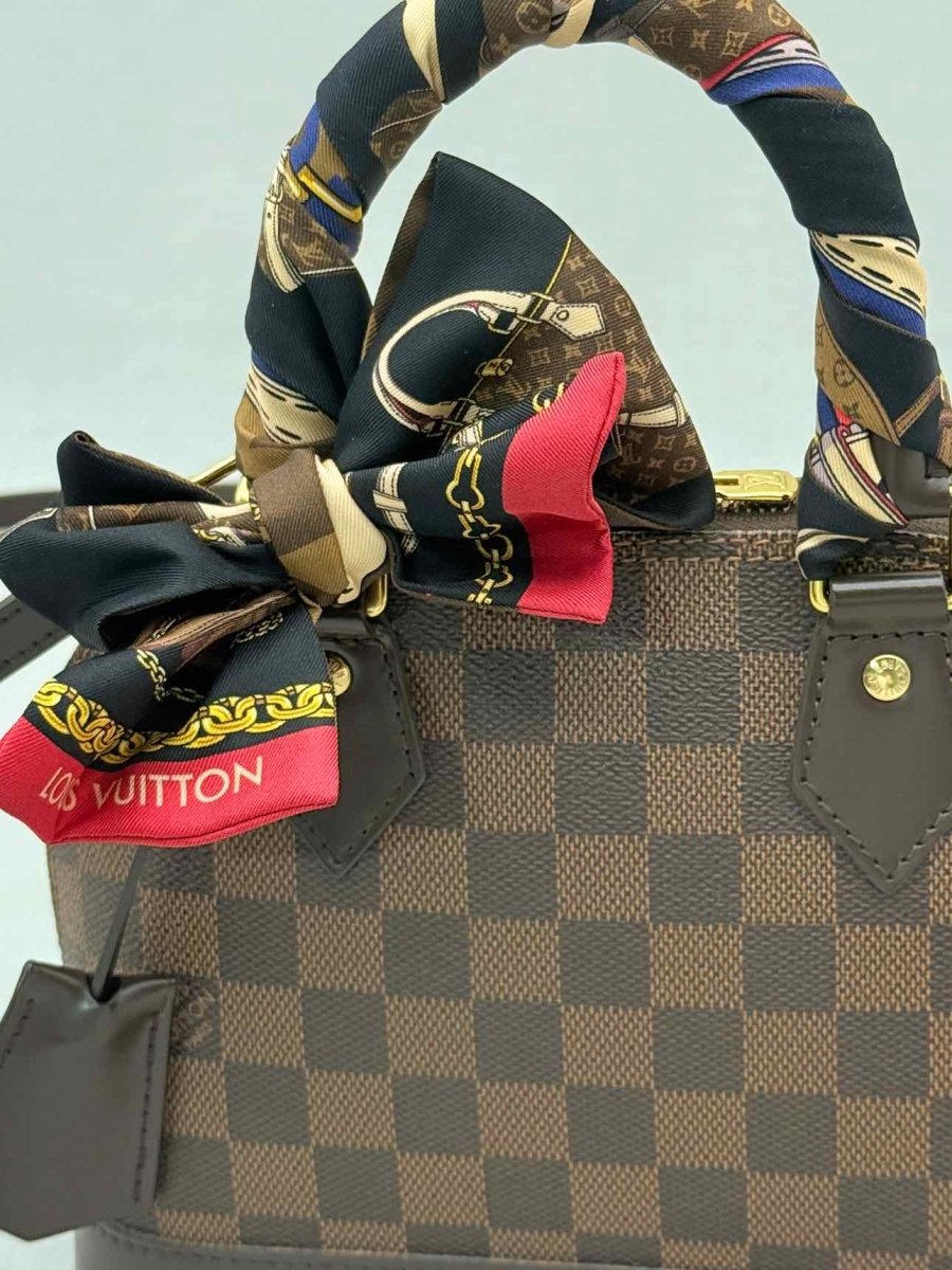 Pre - loved LOUIS VUITTON Alma Brown Damier Ebene Top Handle at Reems Closet