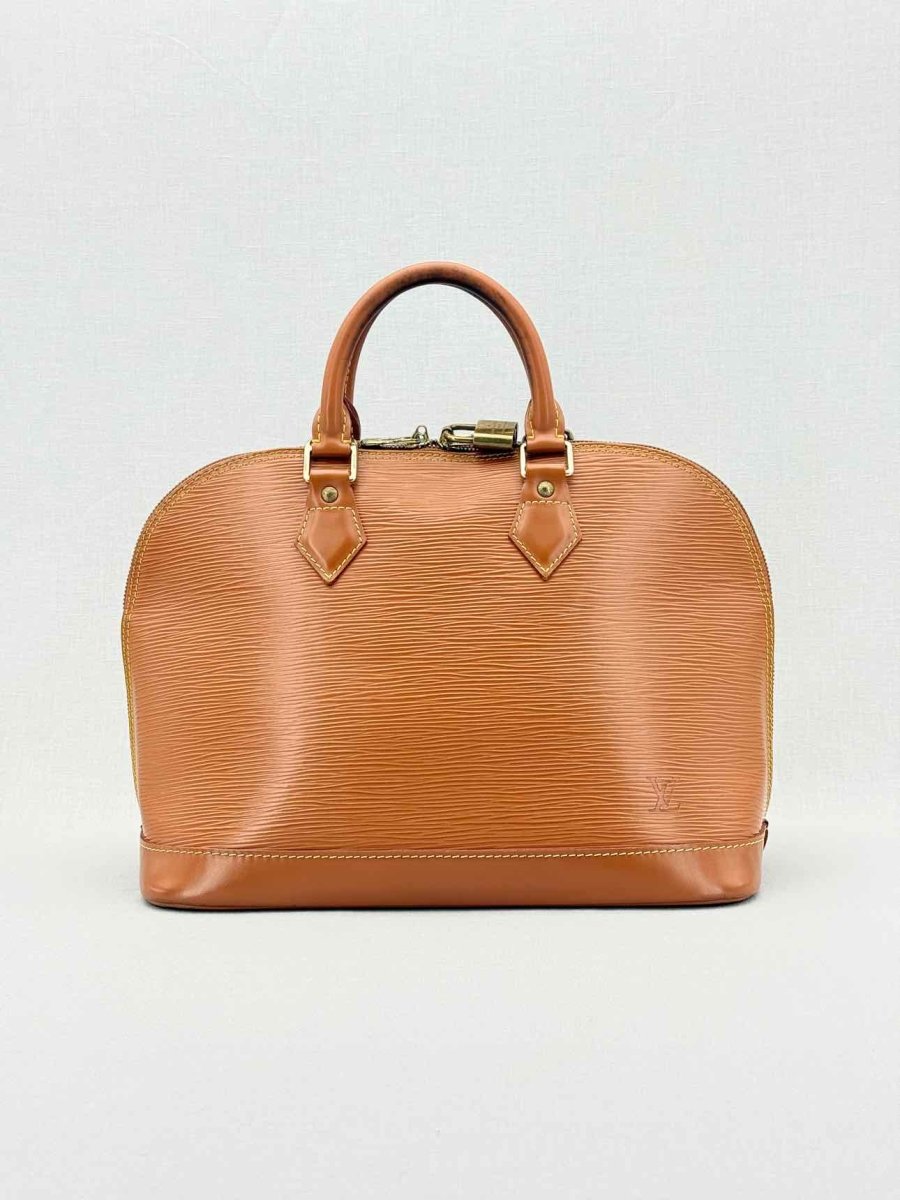 Pre - loved LOUIS VUITTON Alma Camel Top Handle at Reems Closet