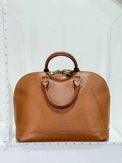 Pre - loved LOUIS VUITTON Alma Camel Top Handle at Reems Closet