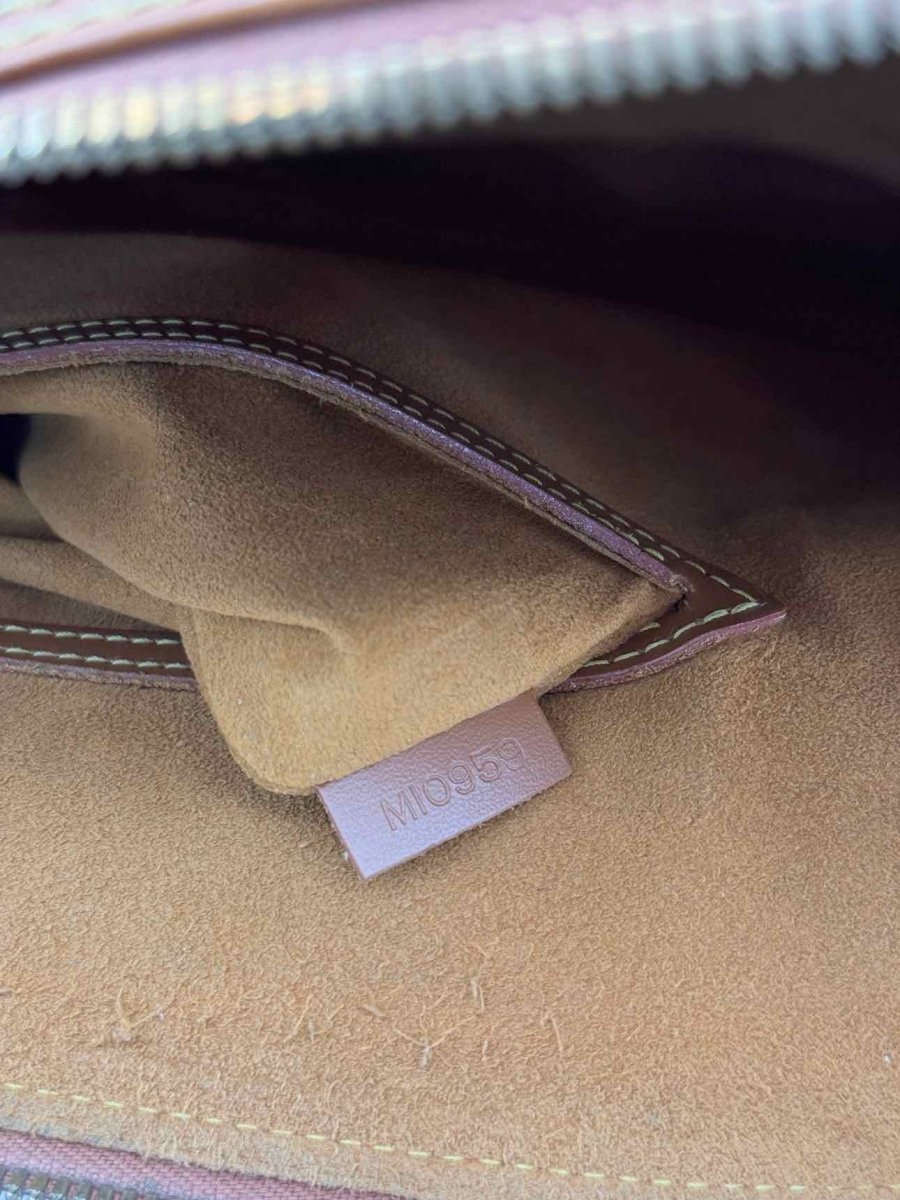 Pre - loved LOUIS VUITTON Alma Camel Top Handle at Reems Closet
