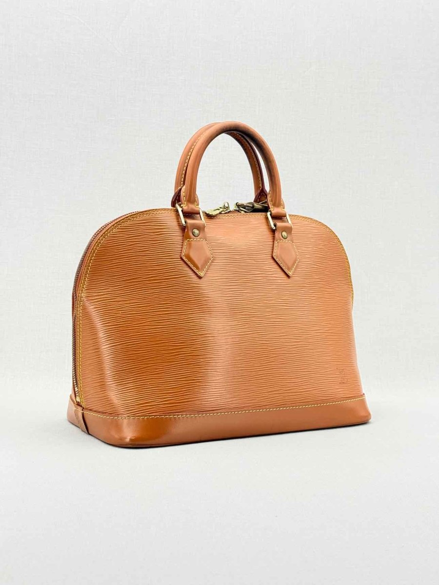 Pre - loved LOUIS VUITTON Alma Camel Top Handle at Reems Closet