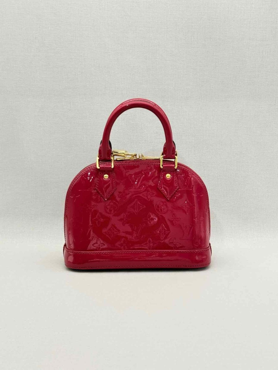 Pre-loved LOUIS VUITTON Alma Red Monogram Top Handle at Reems Closet