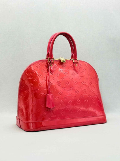 Pre-loved LOUIS VUITTON Alma Red Monogram Top Handle at Reems Closet