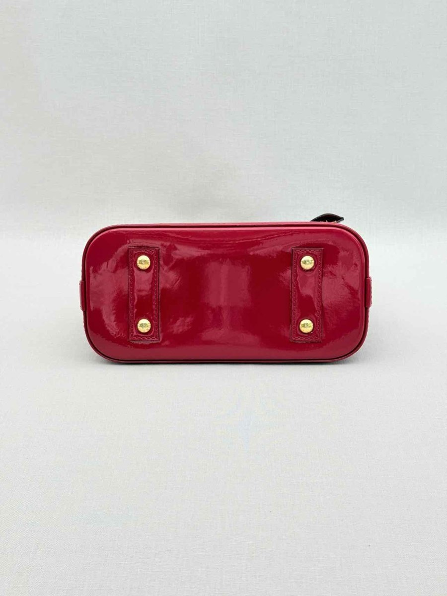 Pre-loved LOUIS VUITTON Alma Red Monogram Top Handle at Reems Closet