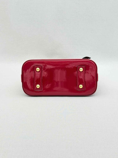 Pre-loved LOUIS VUITTON Alma Red Monogram Top Handle at Reems Closet