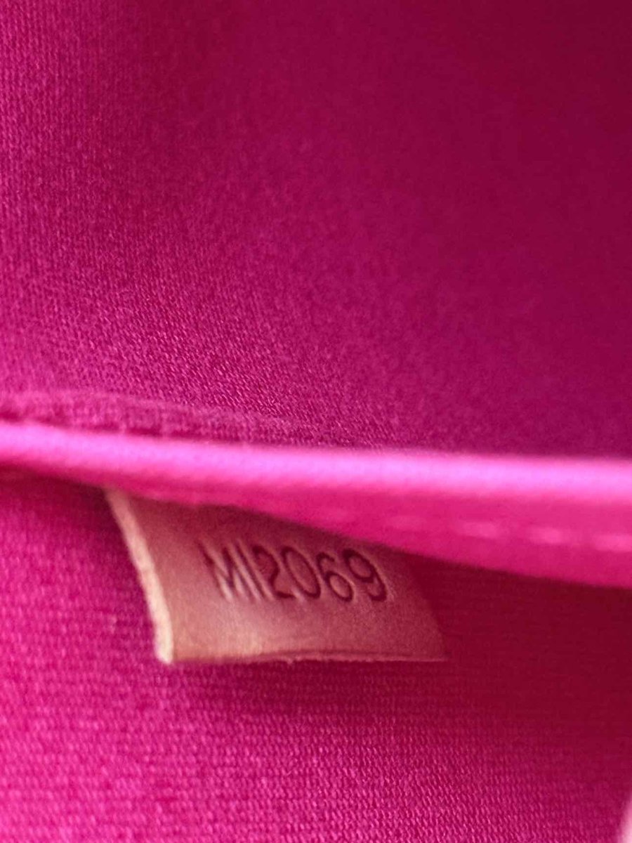 Pre-loved LOUIS VUITTON Alma Red Monogram Top Handle at Reems Closet