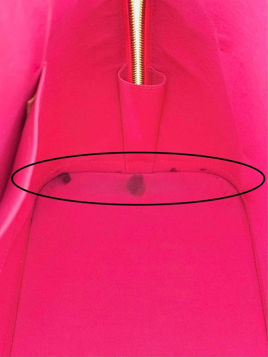 Pre-loved LOUIS VUITTON Alma Red Monogram Top Handle at Reems Closet