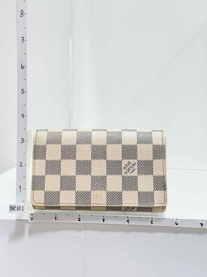 Pre - loved LOUIS VUITTON Beige Damier Azur Continental Wallet at Reems Closet