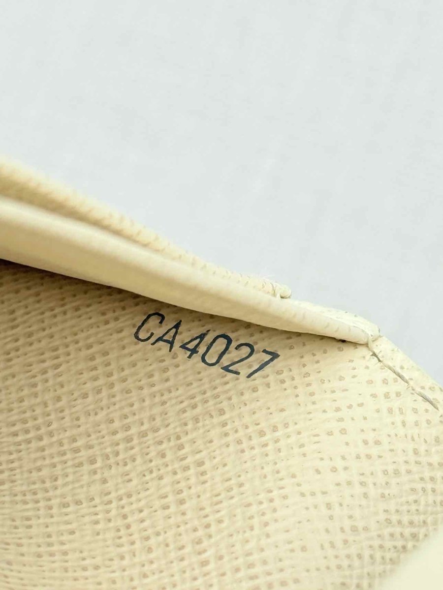 Pre - loved LOUIS VUITTON Beige Damier Azur Continental Wallet at Reems Closet