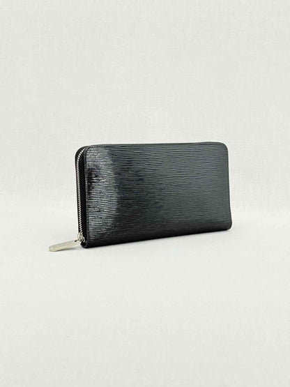 Pre - loved LOUIS VUITTON Black Continental Wallet at Reems Closet