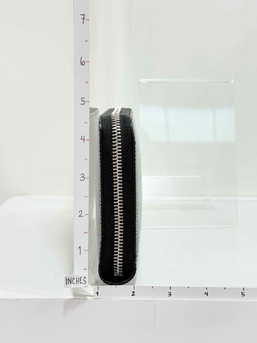 Pre - loved LOUIS VUITTON Black Continental Wallet at Reems Closet