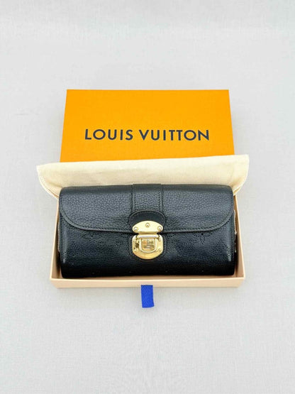 Pre - loved LOUIS VUITTON Black Monogram Continental Wallet at Reems Closet