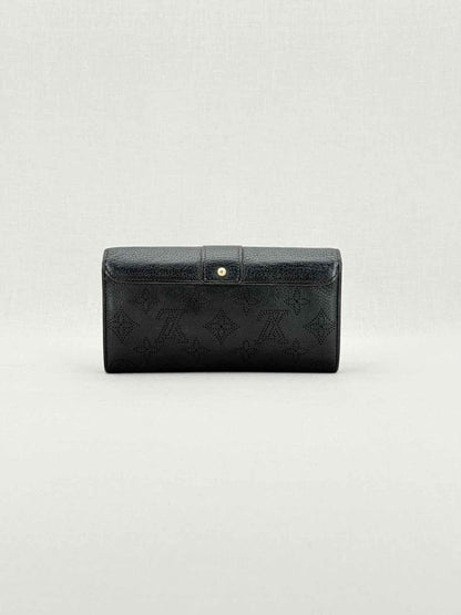Pre - loved LOUIS VUITTON Black Monogram Continental Wallet at Reems Closet