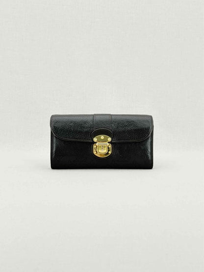 Pre - loved LOUIS VUITTON Black Monogram Continental Wallet at Reems Closet