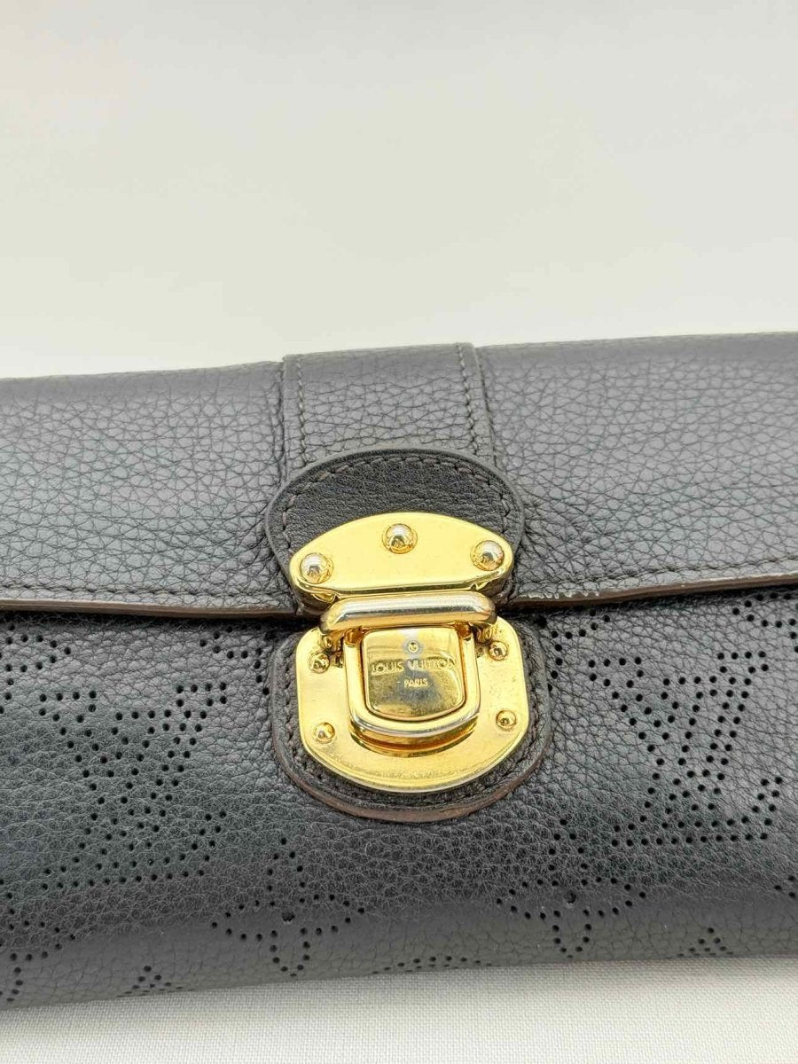 Pre - loved LOUIS VUITTON Black Monogram Continental Wallet at Reems Closet