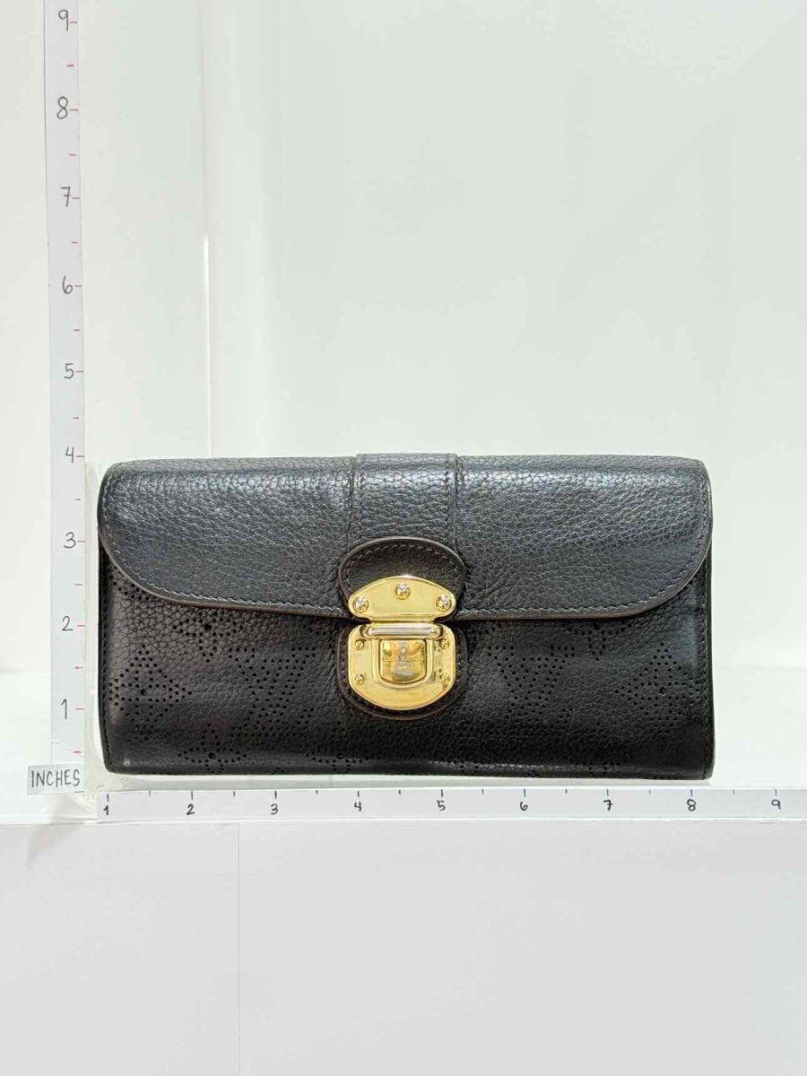 Pre - loved LOUIS VUITTON Black Monogram Continental Wallet at Reems Closet