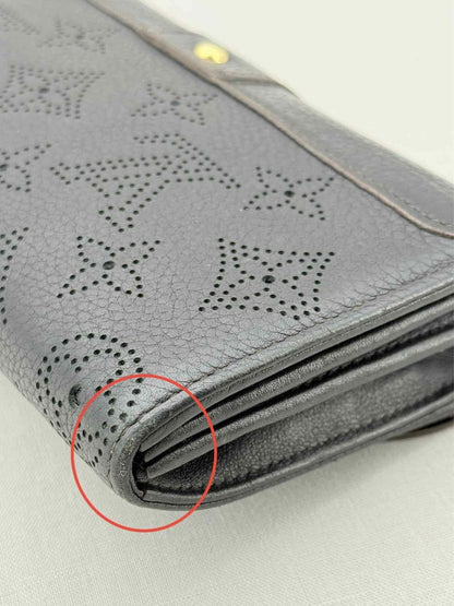 Pre - loved LOUIS VUITTON Black Monogram Continental Wallet at Reems Closet