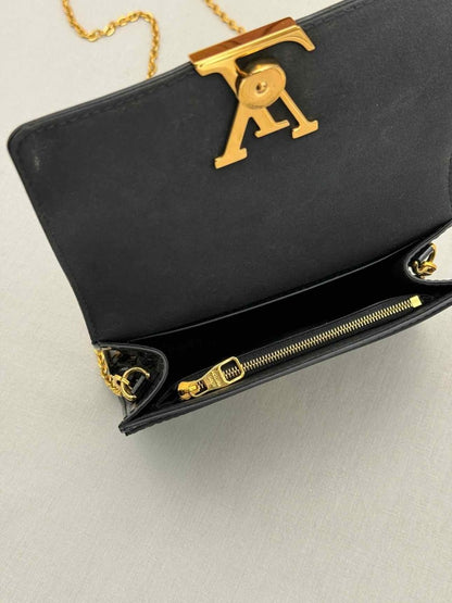 Pre - loved LOUIS VUITTON Black Shoulder Bag at Reems Closet