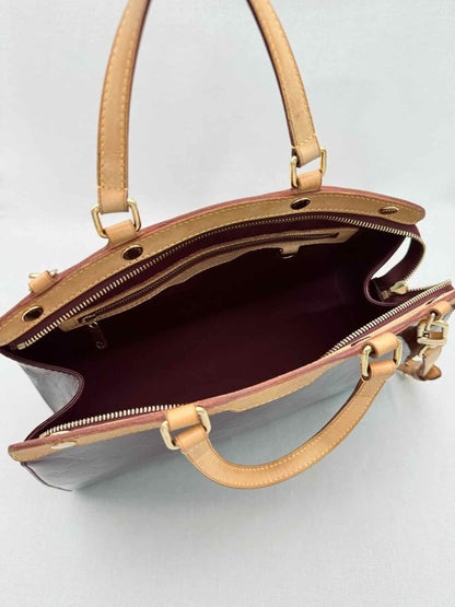 Pre-loved LOUIS VUITTON Brea Rouge Fauviste Monogram Top Handle at Reems Closet