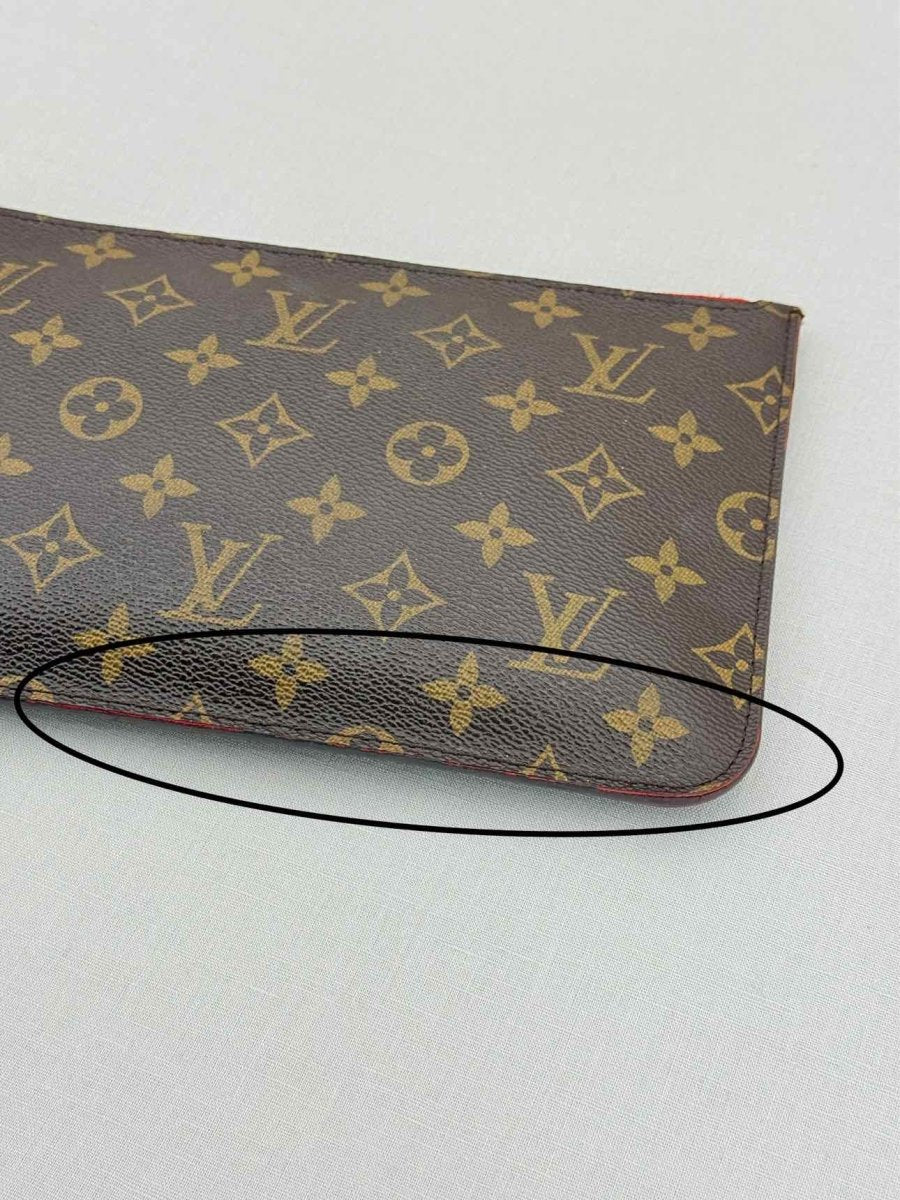 Pre - loved LOUIS VUITTON Brown Monogram Pouch at Reems Closet