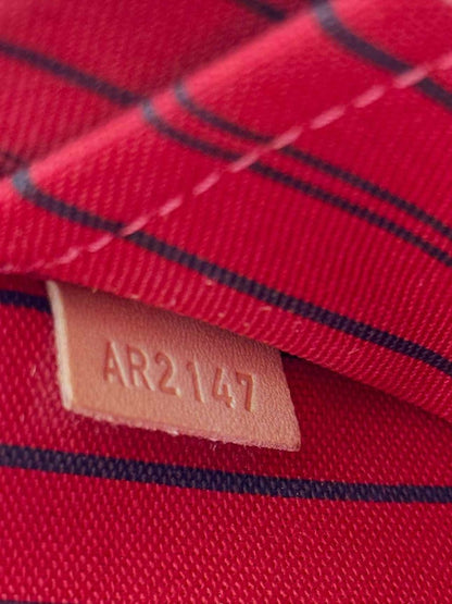 Pre - loved LOUIS VUITTON Brown Monogram Pouch at Reems Closet