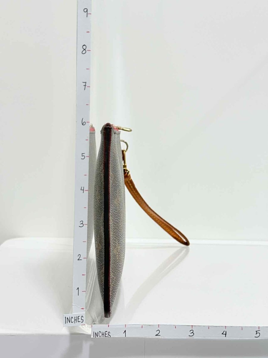 Pre - loved LOUIS VUITTON Brown Monogram Pouch at Reems Closet