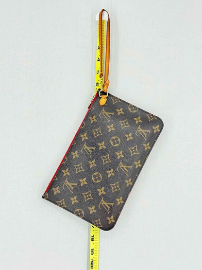 Pre - loved LOUIS VUITTON Brown Monogram Pouch at Reems Closet