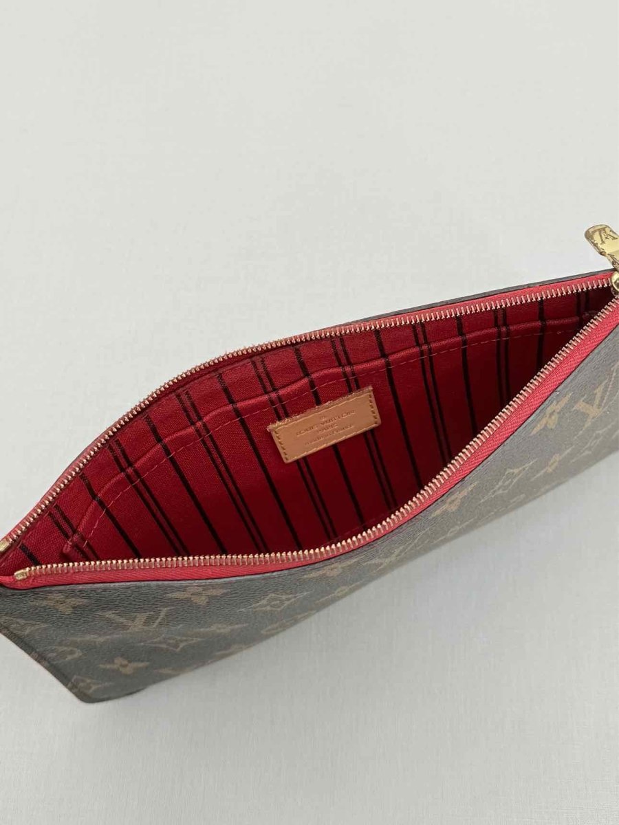 Pre - loved LOUIS VUITTON Brown Monogram Pouch at Reems Closet