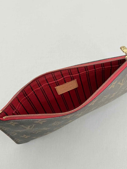 Pre - loved LOUIS VUITTON Brown Monogram Pouch at Reems Closet