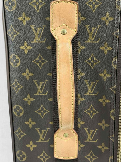 Pre - loved LOUIS VUITTON Brown Monogram Rolling Luggage at Reems Closet