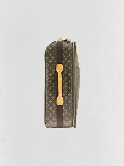Pre - loved LOUIS VUITTON Brown Monogram Rolling Luggage at Reems Closet