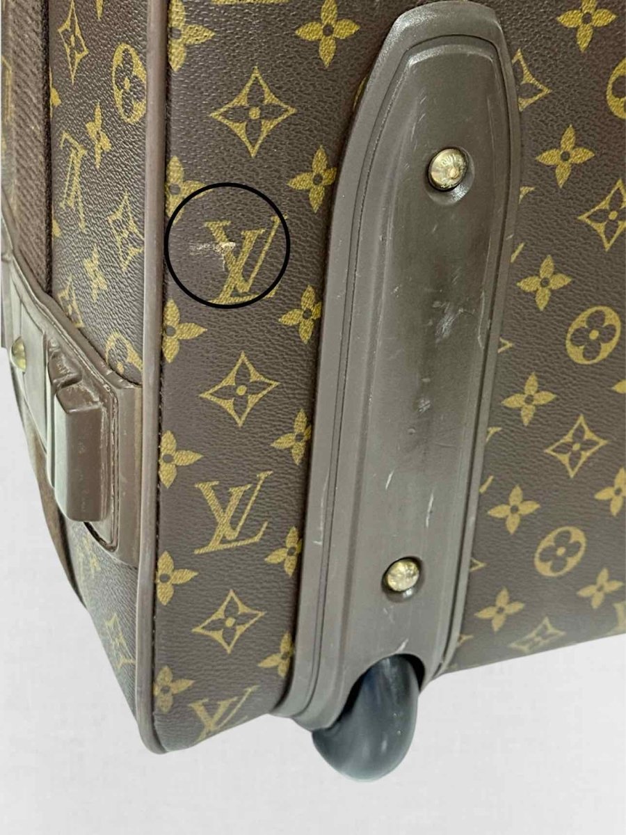 Pre - loved LOUIS VUITTON Brown Monogram Rolling Luggage at Reems Closet