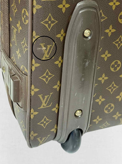 Pre - loved LOUIS VUITTON Brown Monogram Rolling Luggage at Reems Closet