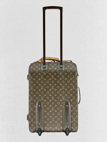 Pre - loved LOUIS VUITTON Brown Monogram Rolling Luggage at Reems Closet