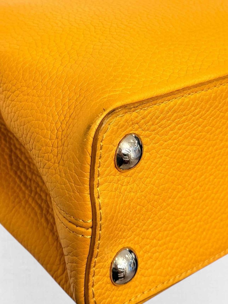 Pre - loved LOUIS VUITTON CAPUCINES Mustard Top Handle at Reems Closet