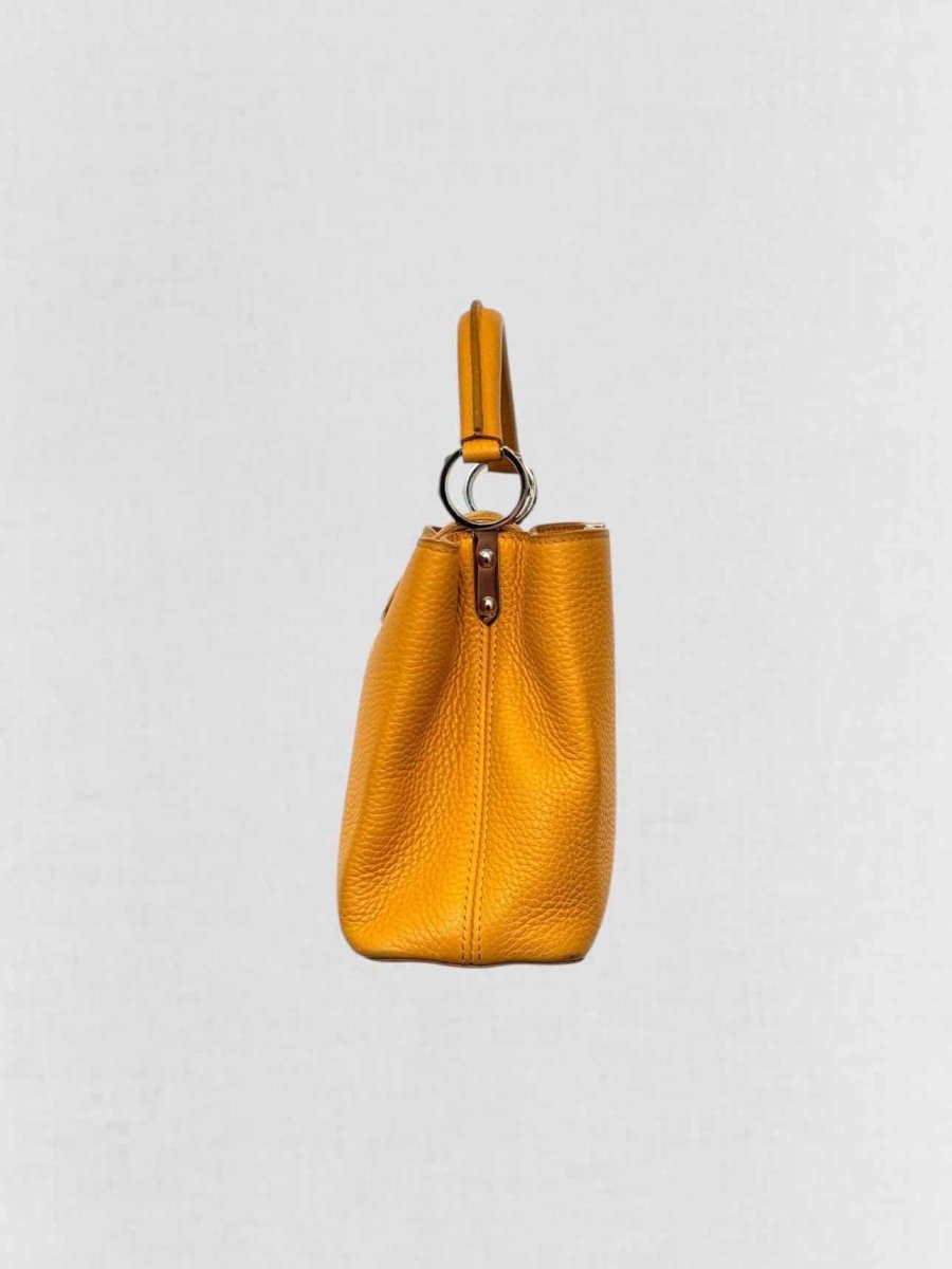 Pre - loved LOUIS VUITTON CAPUCINES Mustard Top Handle at Reems Closet
