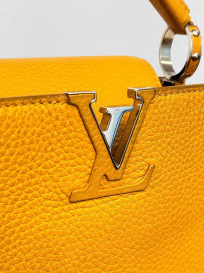 Pre - loved LOUIS VUITTON CAPUCINES Mustard Top Handle at Reems Closet