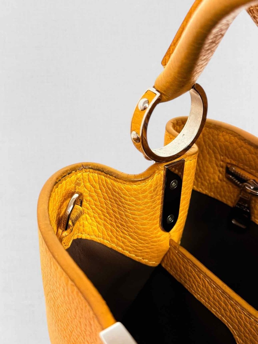 Pre - loved LOUIS VUITTON CAPUCINES Mustard Top Handle at Reems Closet