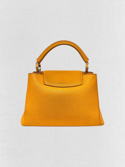 Pre - loved LOUIS VUITTON CAPUCINES Mustard Top Handle at Reems Closet