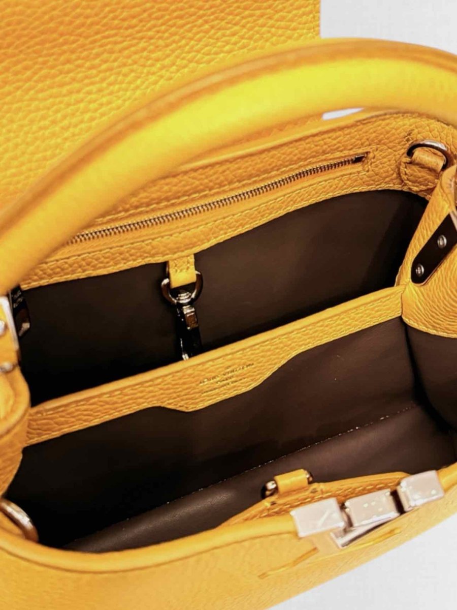 Pre - loved LOUIS VUITTON CAPUCINES Mustard Top Handle at Reems Closet
