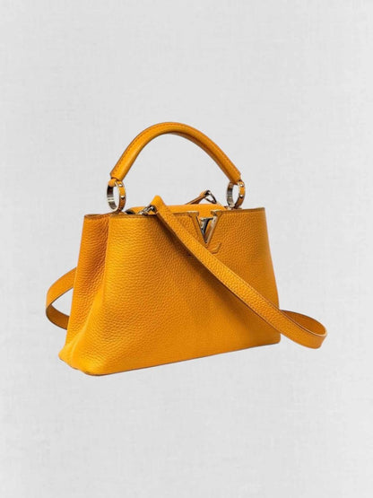 Pre - loved LOUIS VUITTON CAPUCINES Mustard Top Handle at Reems Closet